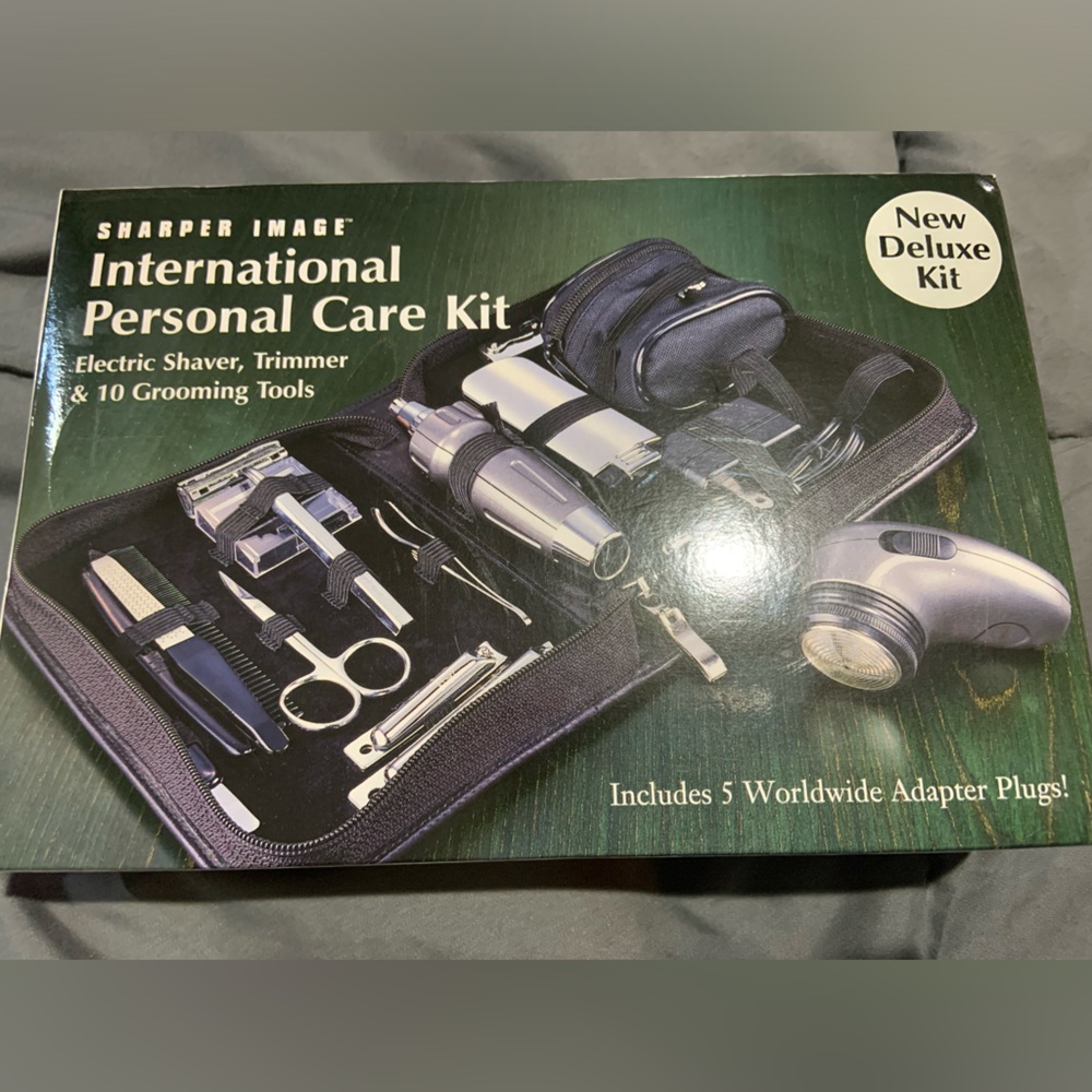 NEW! Never opened SHARPER IMAGE international personal care kit.